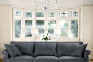 white-pantation-shutters-bay-window