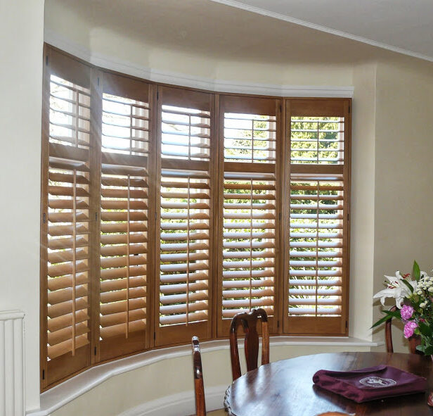 Wooden Bay Window Shutters in living room