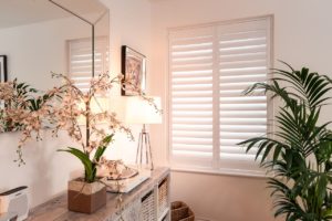 white-plantation-shutters-in-hallway